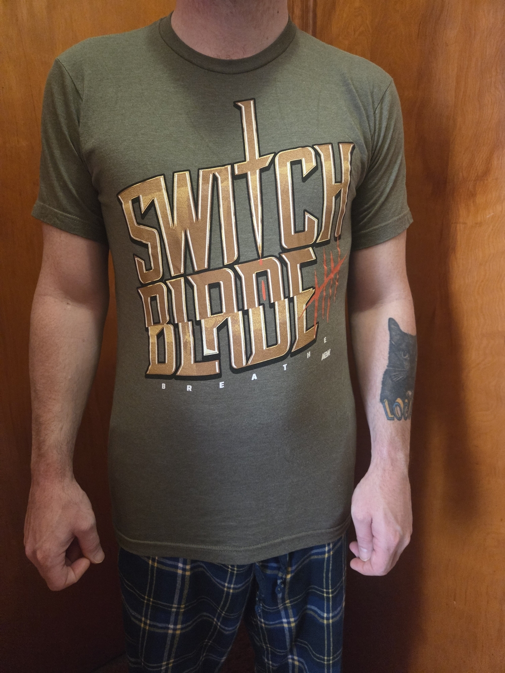 AEW Switchblade Jay White Logo Tee - Olive Green Short Sleeve Men’s Shirt